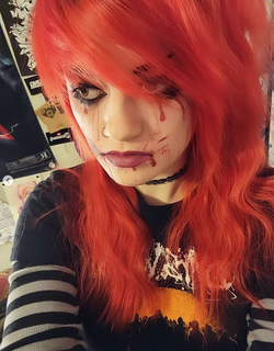 Red, orange hair color, special effects makeup, blood stains and splatters, Dying Wish t-shirt, nose ring, choker, selfie