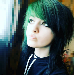 Shaggy emo hair, green and blue, black eyeliner, hoodie, choker.